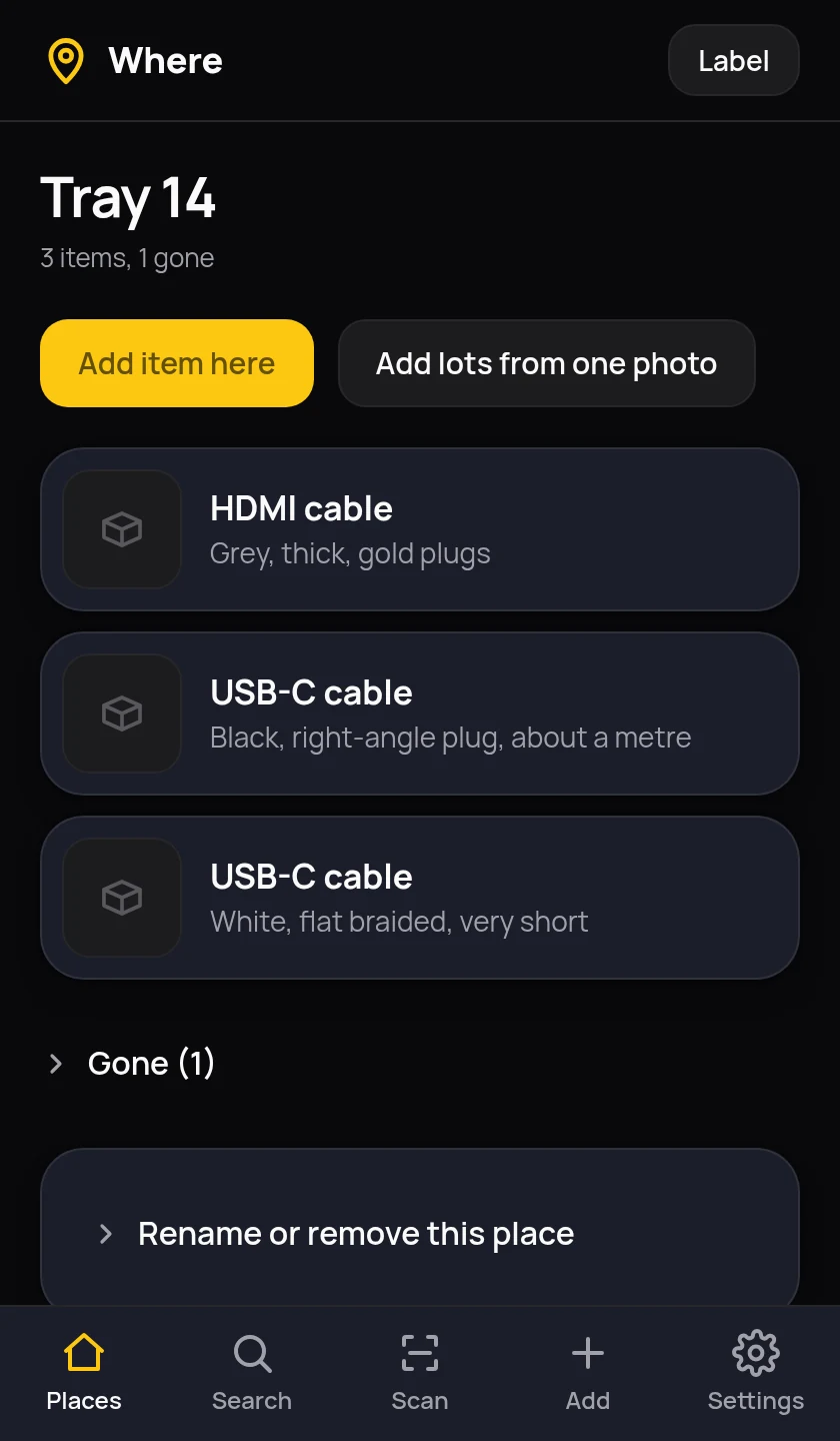 The Tray 14 page in Where, listing an HDMI cable and two USB-C cables with their descriptions, a collapsed section for items marked gone, and buttons to add an item or add lots from one photo.
